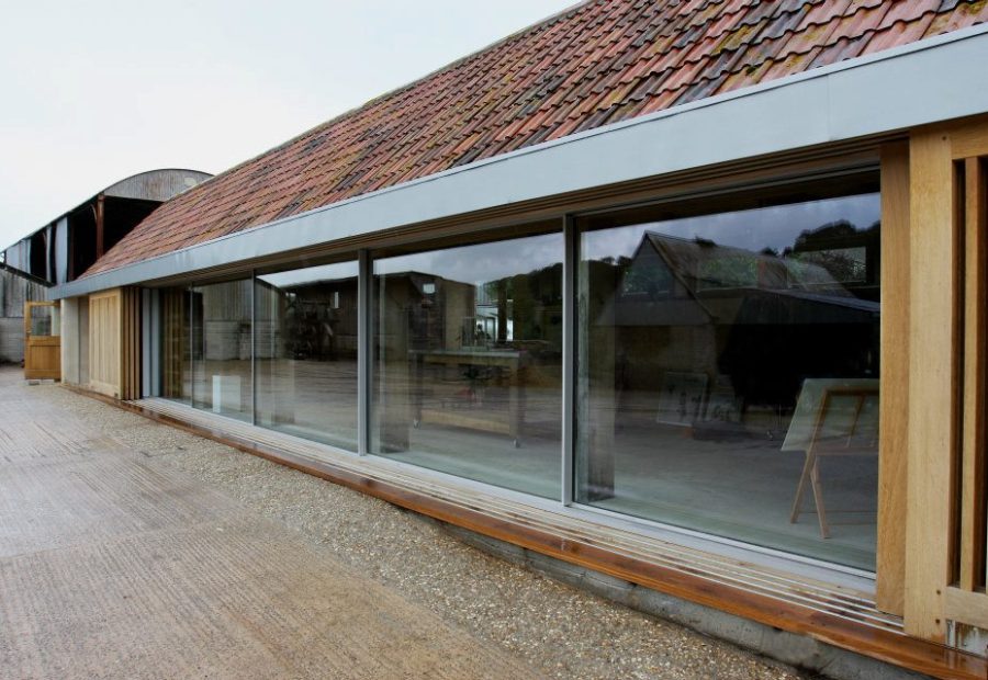 Converted Farm Building - O2i Design Consultants Converted farm buildings are transformed into a sustainable family home on Somerset Levels. Recognised for eco-friendly design & Green Apple Award winner.